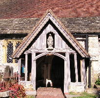 Porch with statue of the Virgin Mary above